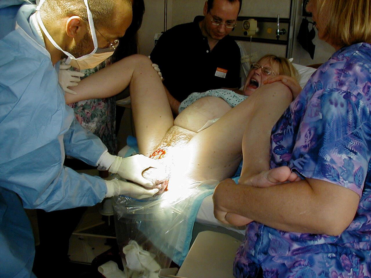 doctor pulling baby out) 